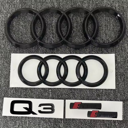 KIT completo LOGHI AUDI Q3 - Nero lucido - Fregi anteriore posteriore targhetta Q3