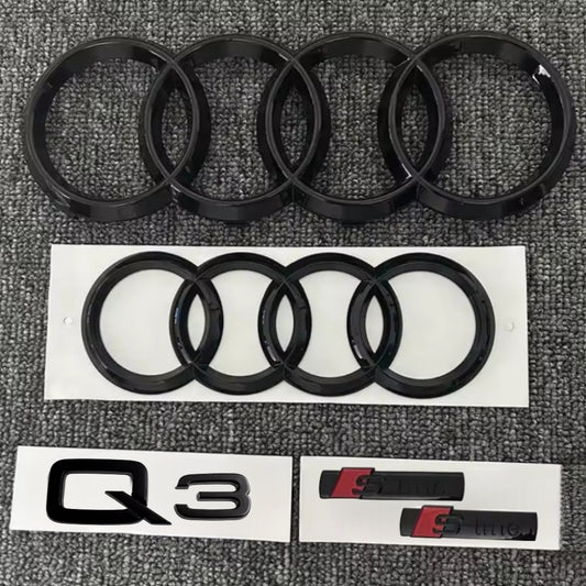 KIT completo LOGHI AUDI Q3 - Nero lucido - Fregi anteriore posteriore targhetta Q3