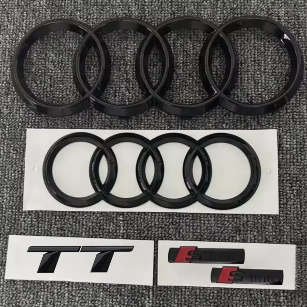 KIT completo LOGHI AUDI TT - Nero lucido - Fregi anteriore posteriore targhetta TT