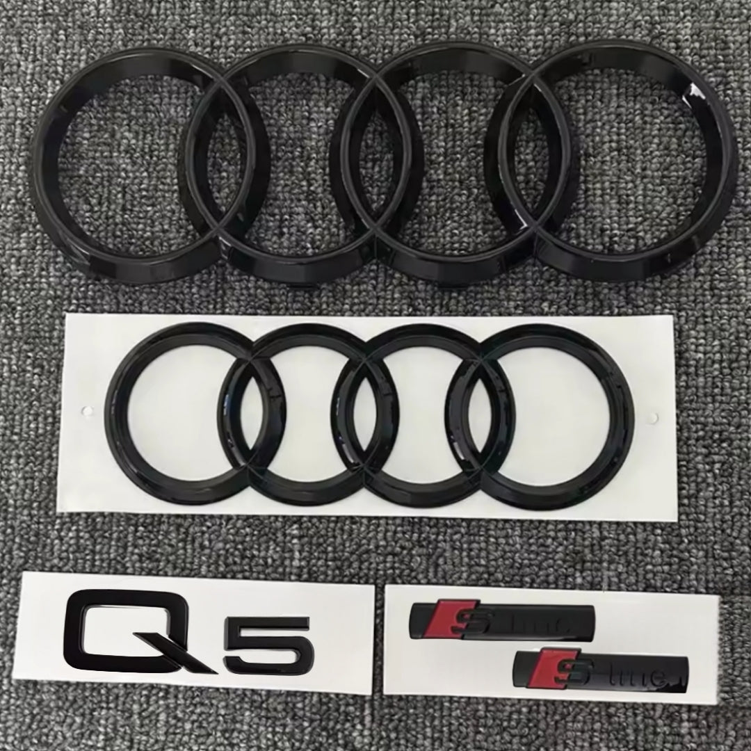KIT completo LOGHI AUDI Q5 - Nero lucido - Fregi anteriore posteriore targhetta Q5